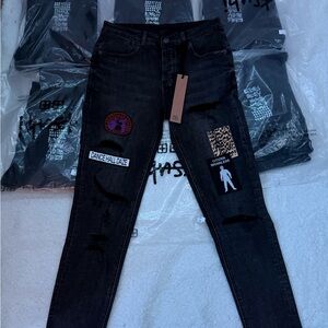 Stylish Black Jeans with Unique Patches